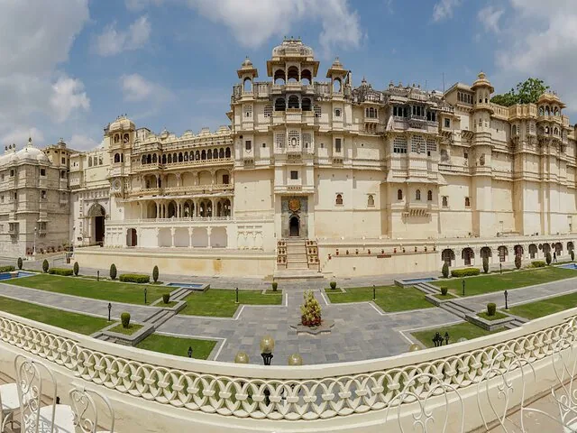 A wide view of the majestic City Palace complex with courtyards and intricate architecture.